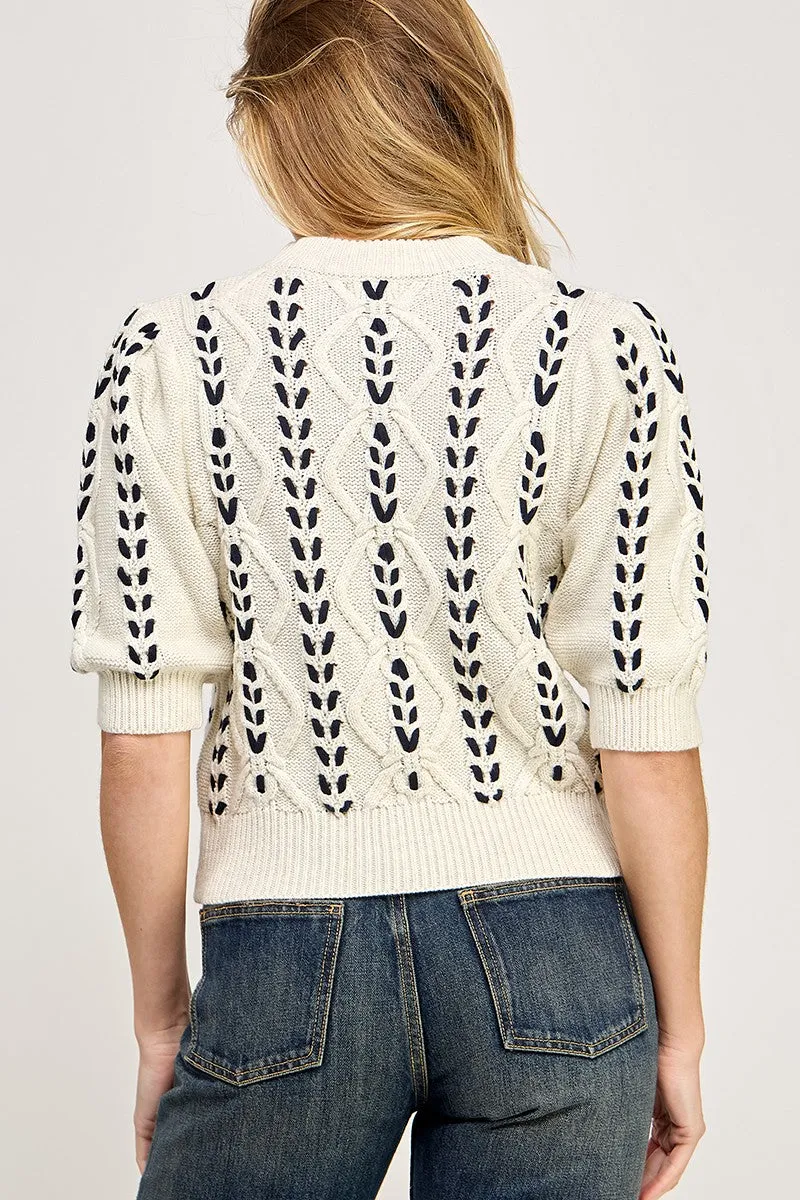 FARM CABLE KNIT SWEATER